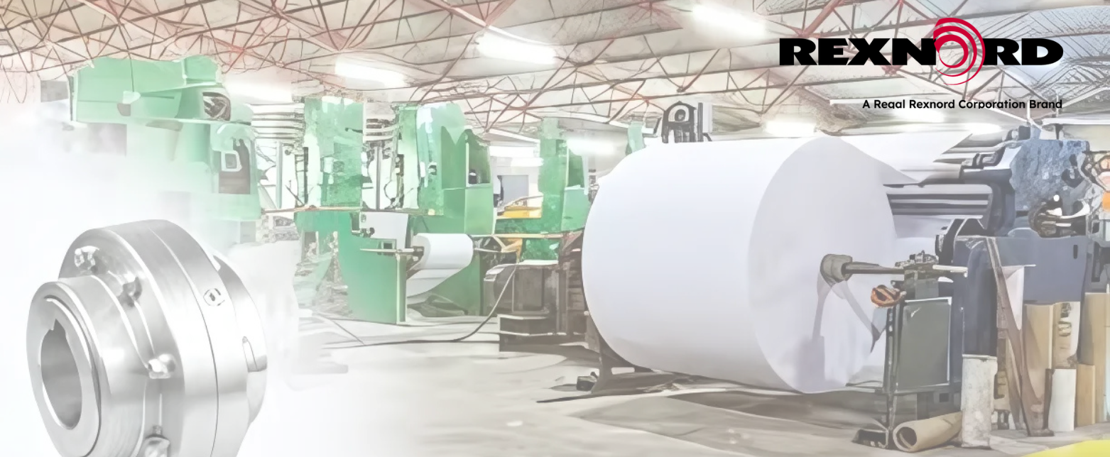 A heavy-duty Rexnord shaft coupling used for reliable power transmission in a demanding paper manufacturing plant application.